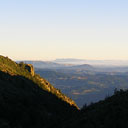 distant mountain view through crevice of two hills